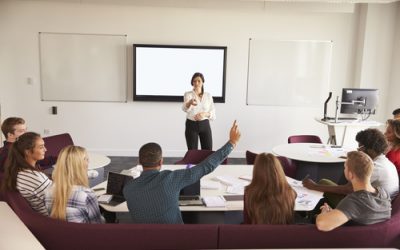 University Students Attending Lecture On Campus